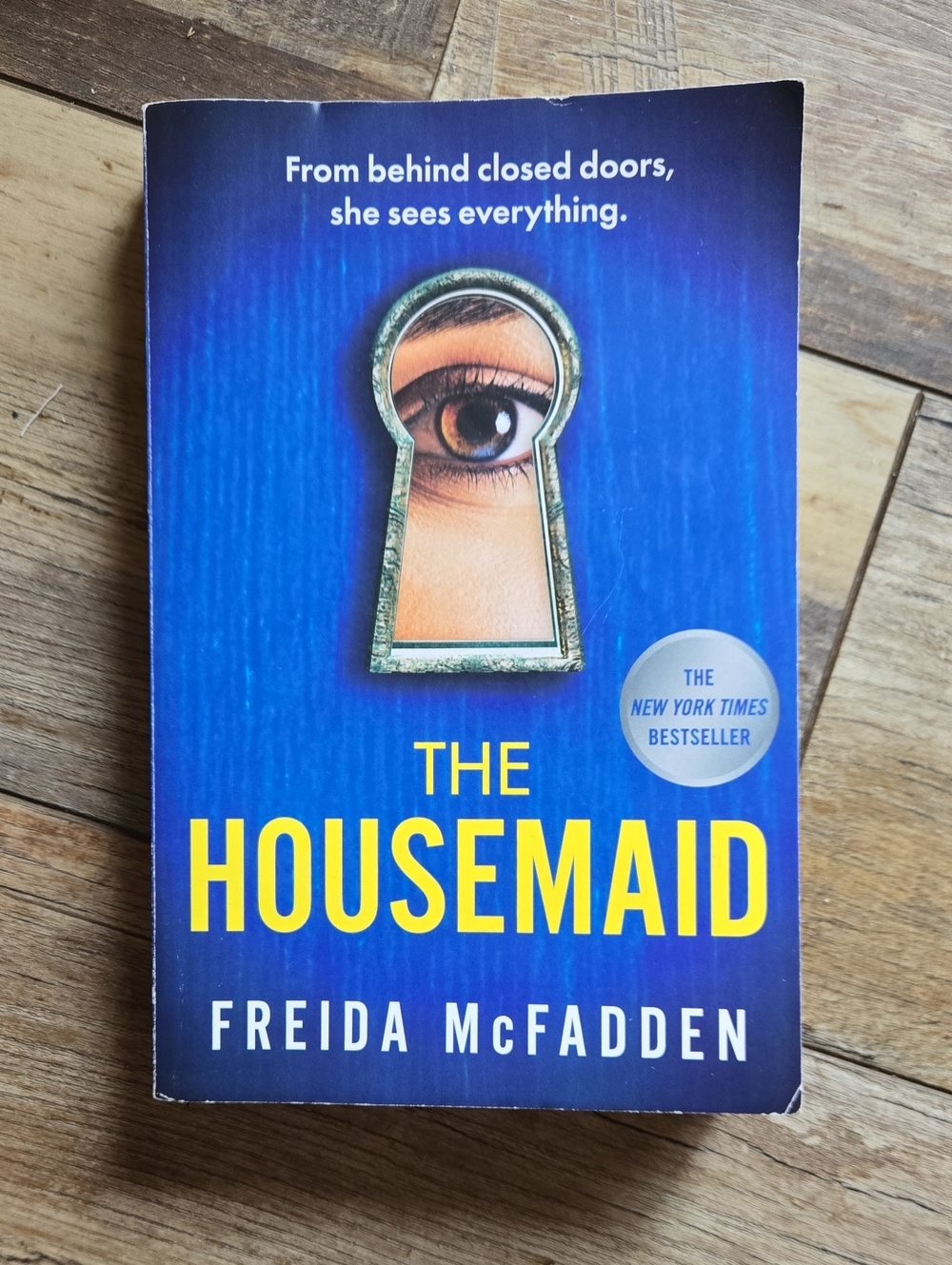The Housemaid by Freida McFadden — Blue & Yellow Paperback